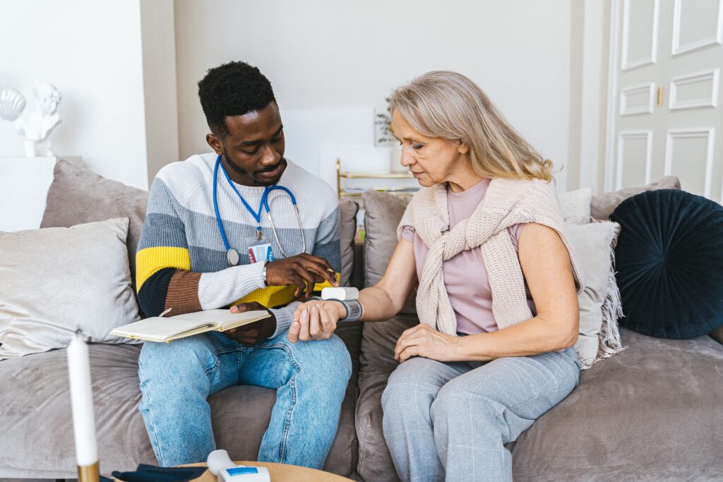 compassionate-home-care-vermont Home care professional assisting an older adult safely at home in Vermont